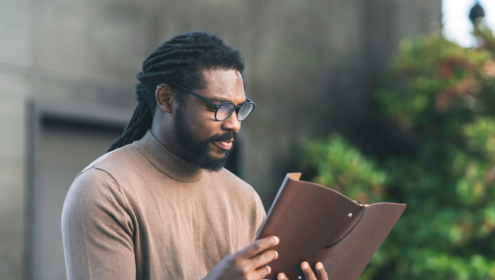 an actor reading a book