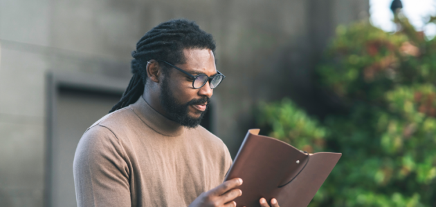 an actor reading a book